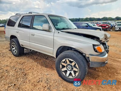 Czwarte zdjęcie samochodu z boku: 1999 TOYOTA 4RUNNER SR5 VIN:JT3GN86R2X0095289 - miniatura
