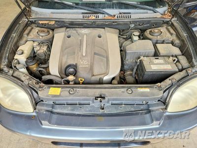 Zdjęcie 12 z 14 samochodu: 2006 HYUNDAI SANTA FE GLS VIN:KM8SC73E66U109284 - miniatura