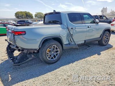 Trzecie zdjęcie samochodu z tyłu: 2024 RIVIAN R1T ADVENTURE VIN:7FCTGAAA6RN033570 - miniatura