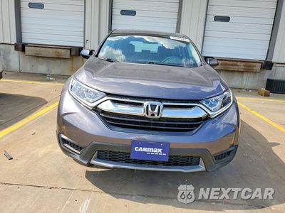 Piąte zdjęcie samochodu w środku: 2019 HONDA CR-V LX VIN:2HKRW6H35KH226502 - miniatura