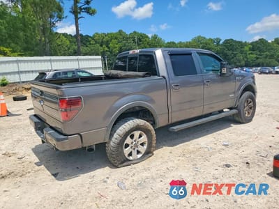 Trzecie zdjęcie samochodu z tyłu: 2014 FORD F150 SUPERCREW VIN:1FTFW1ET0EFB92672 - miniatura