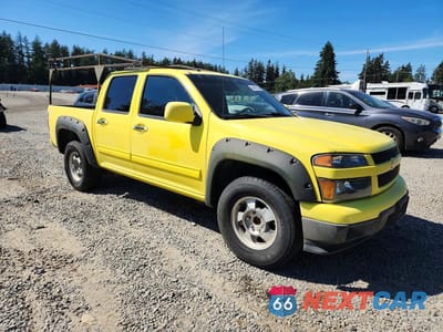 Czwarte zdjęcie samochodu z boku: 2012 CHEVROLET COLORADO LT VIN:1GCDSCF91C8151065 - miniatura