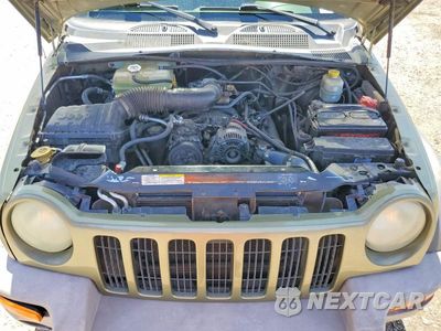 Zdjęcie 11 z 12 samochodu: 2004 JEEP LIBERTY SPORT VIN:1J4GK48K44W218963 - miniatura