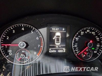Zdjęcie 9 z 13 samochodu: 2014 VOLKSWAGEN EOS KOMFORT VIN:WVWBW8AH9EV000132 - miniatura