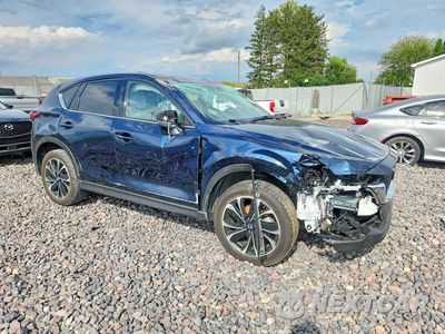 Czwarte zdjęcie samochodu z boku: 2023 MAZDA CX-5 PREMIUM VIN:JM3KFBDM5P0237620 - miniatura