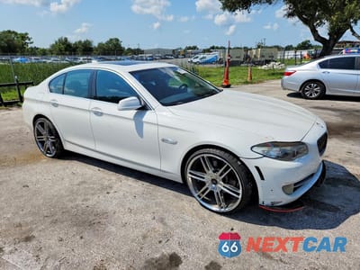 Czwarte zdjęcie samochodu z boku: 2011 BMW 5 SERIES I VIN:WBAFR7C54BC801853 - miniatura