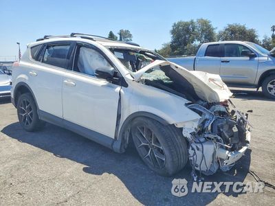 Czwarte zdjęcie samochodu z boku: 2018 TOYOTA RAV4 SE VIN:JTMNFREV7JJ725510 - miniatura