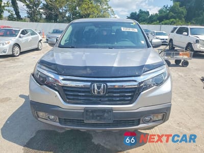 Piąte zdjęcie samochodu w środku: 2020 HONDA RIDGELINE RTL VIN:5FPYK3F73LB001286 - miniatura
