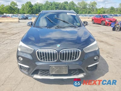 Piąte zdjęcie samochodu w środku: 2018 BMW X1 XDRIVE28I VIN:WBXHT3C34J5L32323 - miniatura