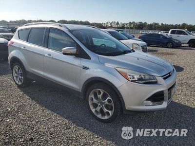 Czwarte zdjęcie samochodu z boku: 2016 FORD ESCAPE TITANIUM VIN:1FMCU9J94GUC42727 - miniatura