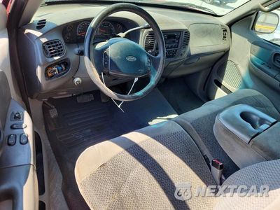 Zdjęcie 8 z 12 samochodu: 1999 FORD F150 VIN:1FTRX17L8XNB17699 - miniatura