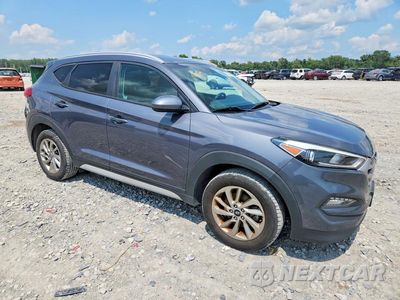 Czwarte zdjęcie samochodu z boku: 2017 HYUNDAI TUCSON SE VIN:KM8J3CA48HU417087 - miniatura