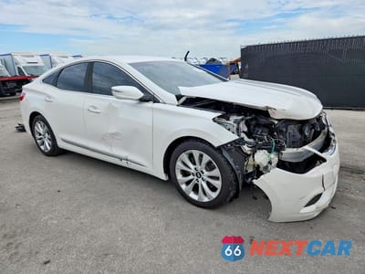 Czwarte zdjęcie samochodu z boku: 2014 HYUNDAI AZERA BASE VIN:KMHFG4JG2EA352132 - miniatura