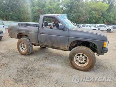 Czwarte zdjęcie samochodu z boku: 1989 NISSAN TRUCK BASE VIN:1N6ND11Y7KC349112 - miniatura