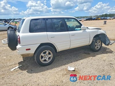 Trzecie zdjęcie samochodu z tyłu: 1999 TOYOTA RAV4 BASE VIN:JT3GP10V1X7064629 - miniatura