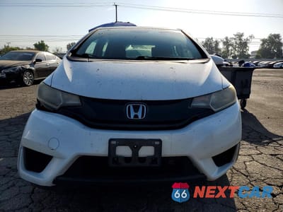 Piąte zdjęcie samochodu w środku: 2017 HONDA FIT LX VIN:JHMGK5H53HS020263 - miniatura