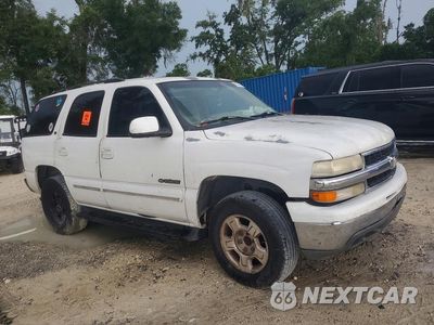 Czwarte zdjęcie samochodu z boku: 2001 CHEVROLET TAHOE C1500 VIN:1GNEC13T11J151635 - miniatura