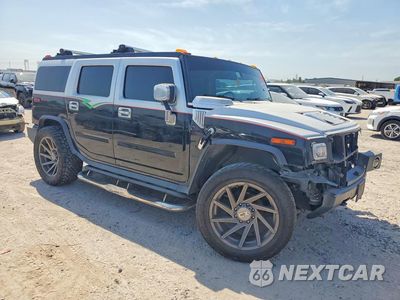 Czwarte zdjęcie samochodu z boku: 2003 HUMMER H2 VIN:5GRGN23U03H134649 - miniatura