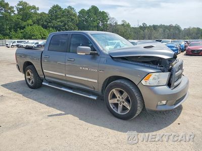 Czwarte zdjęcie samochodu z boku: 2012 DODGE RAM 1500 SPORT VIN:1C6RD6MT3CS333229 - miniatura