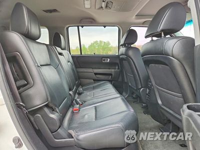 Zdjęcie 11 z 13 samochodu: 2014 HONDA PILOT TOURING VIN:5FNYF4H92EB043856 - miniatura