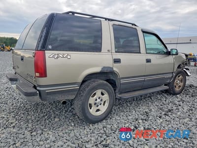 Trzecie zdjęcie samochodu z tyłu: 1999 CHEVROLET TAHOE K1500 VIN:1GNEK13R6XJ412564 - miniatura