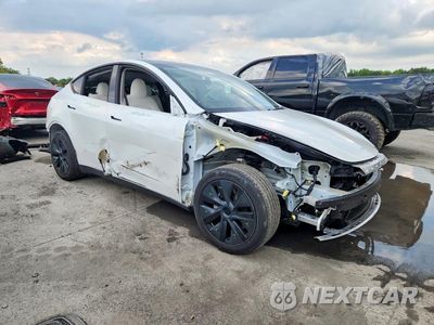 Czwarte zdjęcie samochodu z boku: 2025 TESLA MODEL Y VIN:7SAYGDEE0SF239629 - miniatura