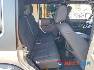 Zdjęcie 10 z 12 samochodu: 2014 JEEP WRANGLER UNLIMITED SPORT VIN:1C4HJWDG1EL237368 - miniatura