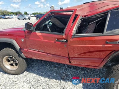 Zdjęcie 8 z 11 samochodu: 1999 JEEP CHEROKEE SPORT VIN:1J4FF68S8XL649646 - miniatura
