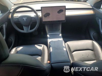 Zdjęcie 8 z 13 samochodu: 2022 TESLA MODEL Y VIN:7SAYGAEE5NF427453 - miniatura
