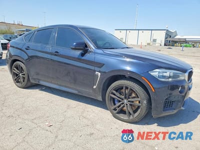 Czwarte zdjęcie samochodu z boku: 2018 BMW X6 X6 M VIN:5YMKW8C51J0Y74542 - miniatura