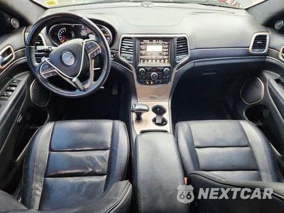 Zdjęcie 8 z 14 samochodu: 2015 JEEP GRAND CHEROKEE SUMMIT VIN:1C4RJEJGXFC808294 - miniatura