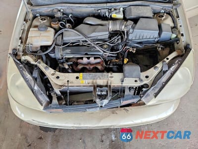 Zdjęcie 12 z 13 samochodu: 2000 FORD FOCUS SE VIN:1FAFP3630YW229639 - miniatura