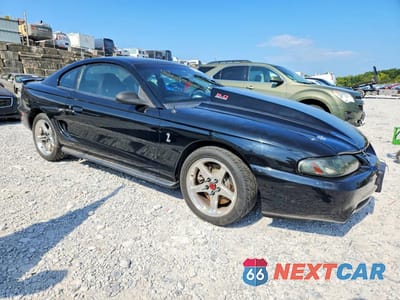 Czwarte zdjęcie samochodu z boku: 1994 FORD MUSTANG COBRA VIN:1FALP42D7RF213432 - miniatura