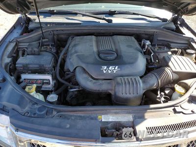 Zdjęcie 12 z 13 samochodu: 2012 JEEP GRAND CHEROKEE LAREDO VIN:1C4RJFAGXCC225905 - miniatura