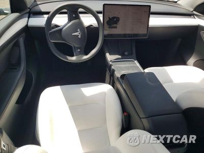 Zdjęcie 8 z 14 samochodu: 2023 TESLA MODEL Y VIN:7SAYGDEE2PF632653 - miniatura