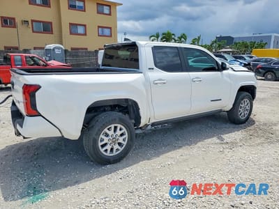 Trzecie zdjęcie samochodu z tyłu: 2026 TOYOTA TACOMA SR5 VIN:3TYKB5FN1TT041858 - miniatura