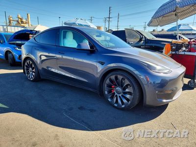 Czwarte zdjęcie samochodu z boku: 2023 TESLA MODEL Y VIN:7SAYGDEF2PF881303 - miniatura
