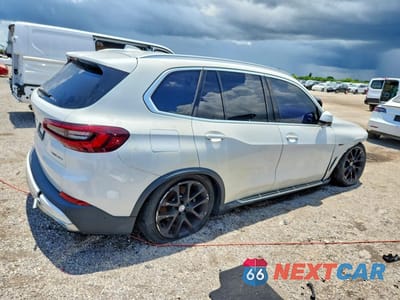 Trzecie zdjęcie samochodu z tyłu: 2023 BMW X5 XDRIVE45E VIN:5UXTA6C05P9N52509 - miniatura