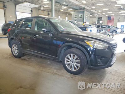 Czwarte zdjęcie samochodu z boku: 2016 MAZDA CX-5 TOURING VIN:JM3KE4CY9G0617529 - miniatura