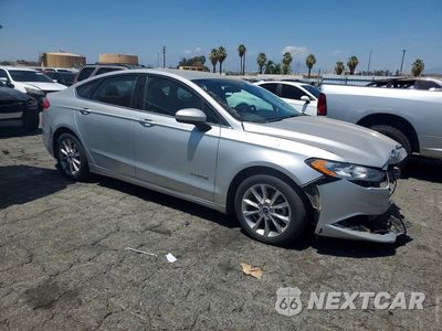 Czwarte zdjęcie samochodu z boku: 2017 FORD FUSION SE HYBRID VIN:3FA6P0LU3HR164039 - miniatura