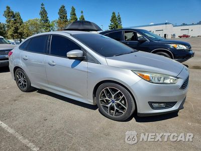 Czwarte zdjęcie samochodu z boku: 2016 FORD FOCUS SE VIN:1FADP3F27GL262989 - miniatura