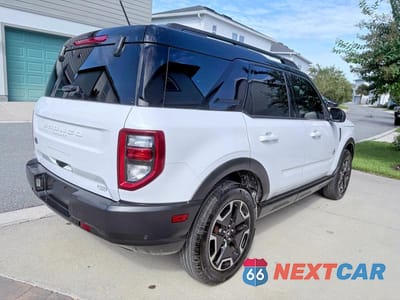 Czwarte zdjęcie samochodu z boku: 2021 FORD BRONCO SPORT OUTER BANKS VIN:3FMCR9C60MRA40457 - miniatura