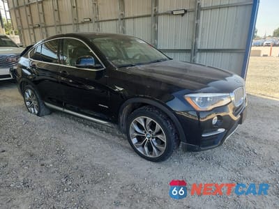 Czwarte zdjęcie samochodu z boku: 2016 BMW X4 4D 4WD VIN:5UXXW5C54G0N93212 - miniatura