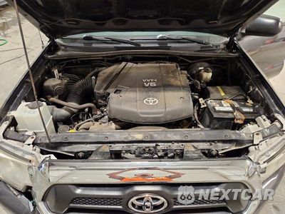Zdjęcie 11 z 12 samochodu: 2014 TOYOTA TACOMA V6 VIN:3TMLU4EN6EM143181 - miniatura
