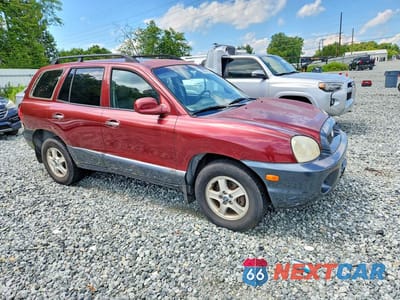 Czwarte zdjęcie samochodu z boku: 2003 HYUNDAI SANTA FE GLS VIN:KM8SC13E93U461851 - miniatura