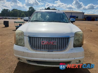 Piąte zdjęcie samochodu w środku: 2011 GMC YUKON SLT VIN:1GKS1CE09BR115425 - miniatura