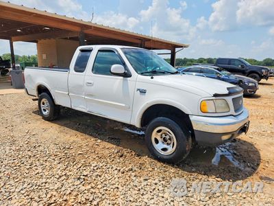 Czwarte zdjęcie samochodu z boku: 1999 FORD F150 VIN:1FTRX18W6XNA02463 - miniatura