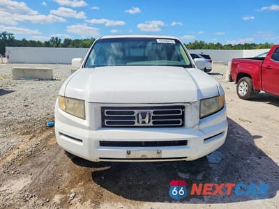 Piąte zdjęcie samochodu w środku: 2006 HONDA RIDGELINE RTL VIN:2HJYK16506H527025 - miniatura