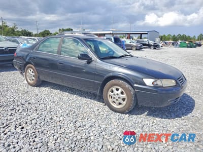 Czwarte zdjęcie samochodu z boku: 1999 TOYOTA CAMRY LE VIN:JT2BG22K7X0294174 - miniatura