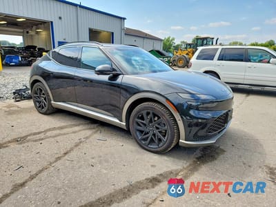 Czwarte zdjęcie samochodu z boku: 2023 GENESIS GV60 ADVANCED VIN:KMUKCDTC2PU010476 - miniatura